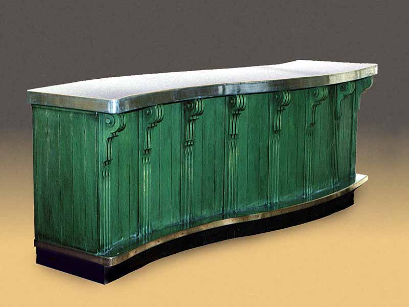 A long green cabinet with a stainless steel top