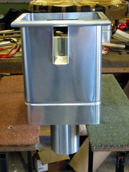 A stainless steel container is sitting on a table