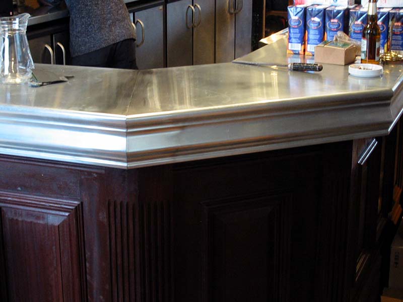 A bar with a stainless steel counter top