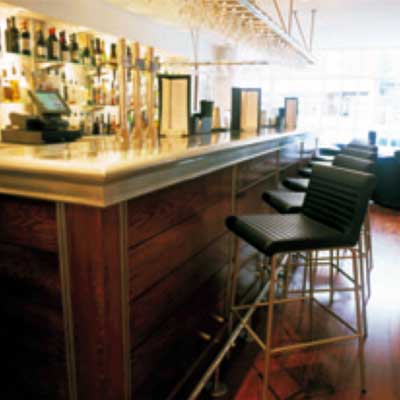 A bar with a lot of bottles on it