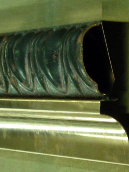 A close up of a picture frame molding on a wall.