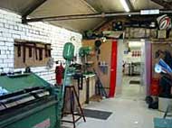 A garage filled with lots of tools and equipment.