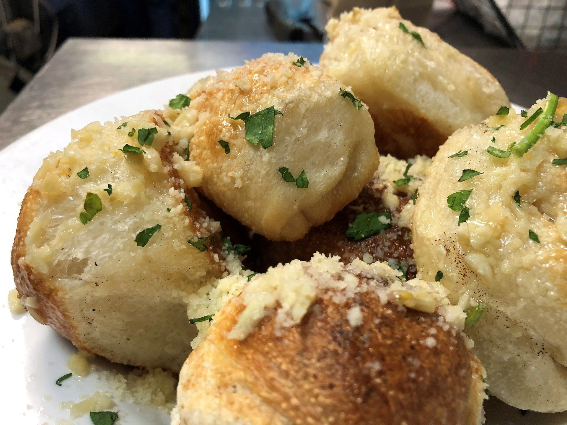 Big Louie’s Pizzeria golden garlic knots with parsley