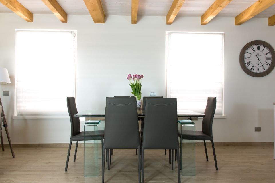 copertura abitazione in legno con travi a vista