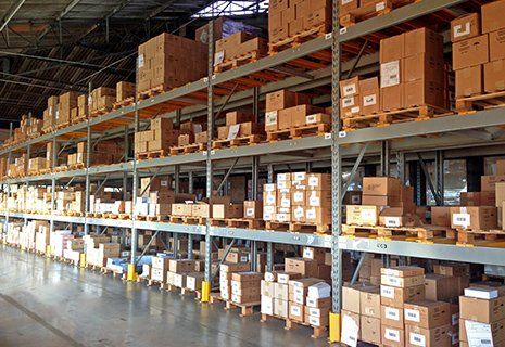 Warehousing — Warehouse with Stacked Containers in Glenolden, PA Warehousing — Warehouse with Stacked Containers in Glenolden, PA