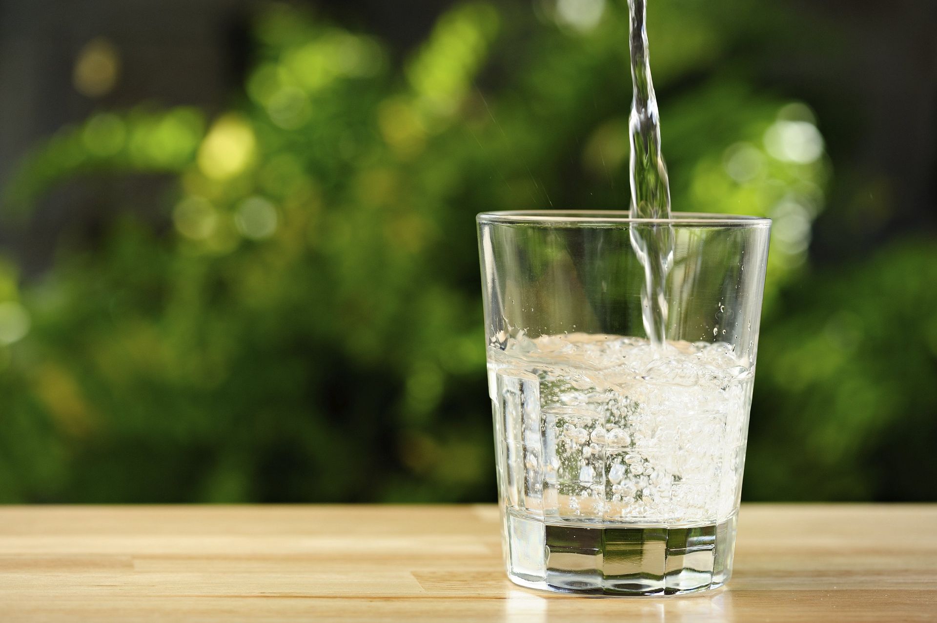 Image of filtered water being poured into a glass