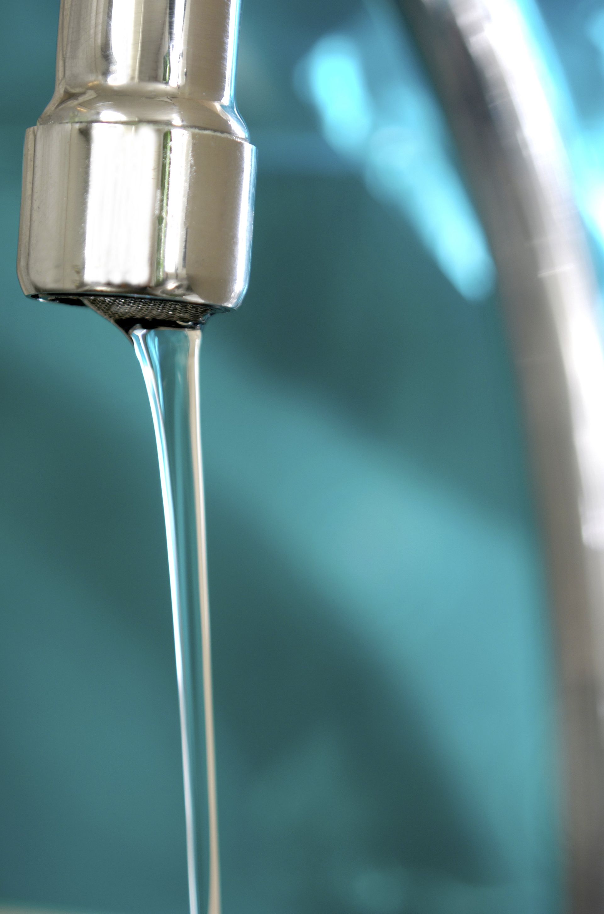 Image of a water running out of a faucet