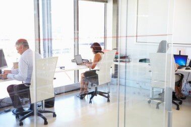 Group of people working in a modern office — Advanced Alarm Company, Colorado Springs CO 80907, USA Group of people working in a modern office — Advanced Alarm Company, Colorado Springs CO 80907, USA