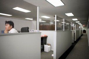 Man working in office — Advanced Alarm Company, Colorado Springs CO 80907, USA Man working in office — Advanced Alarm Company, Colorado Springs CO 80907, USA