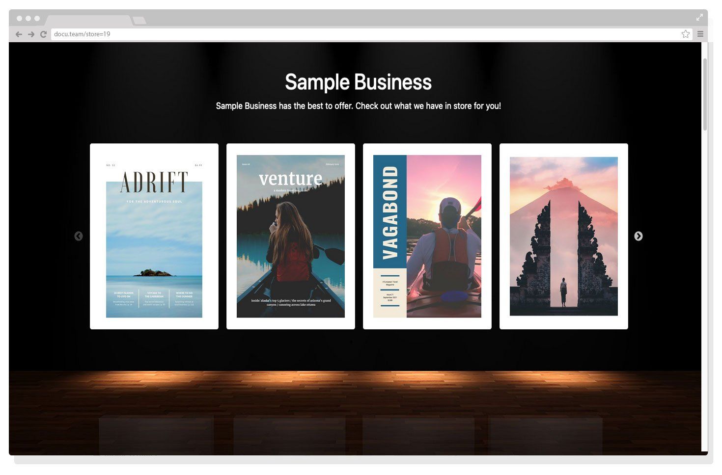 A computer screen shows a sample business website
