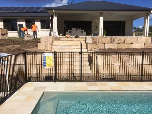 stone wall and pool