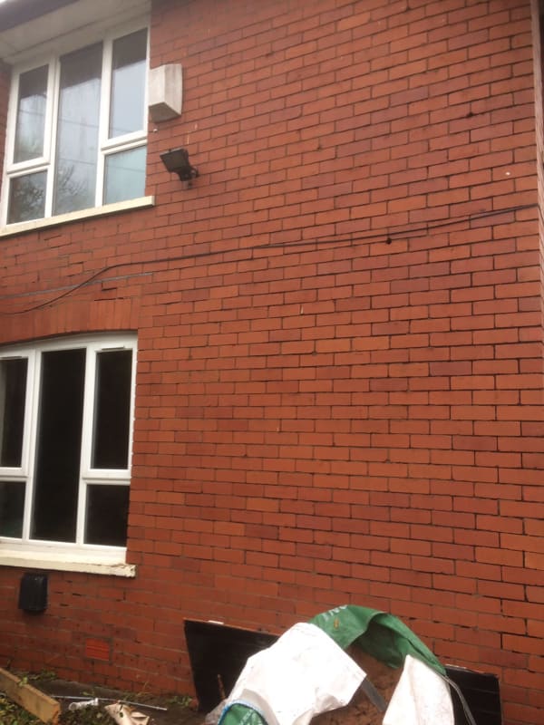 A red brick building with a lot of windows