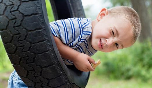 Young Boy Winking — Certified Child Care in Cartersville, GA Young Boy Winking — Certified Child Care in Cartersville, GA