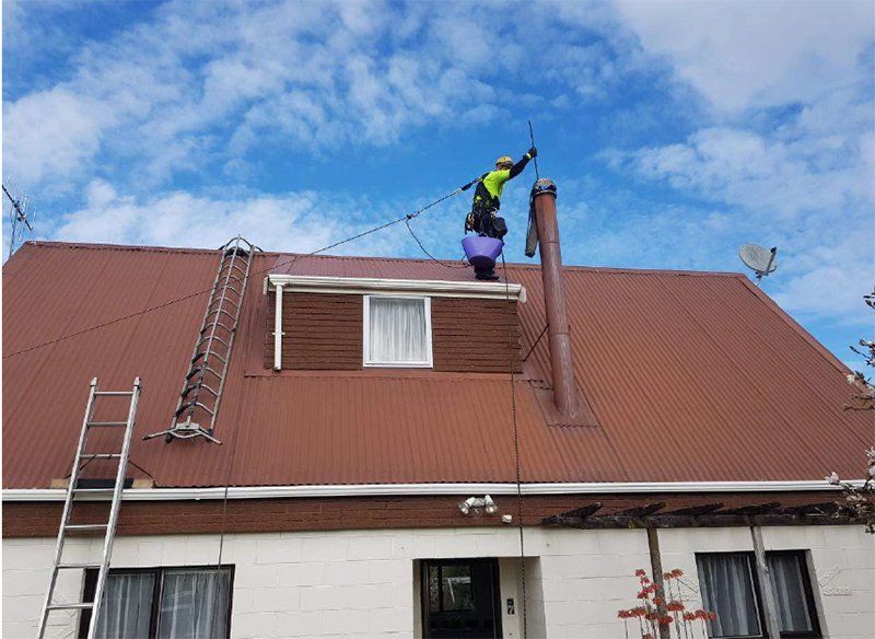 Chimney flue atop a Rodney home after heating installation