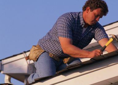 One of our roofing professionals at work in Anchorage, AK