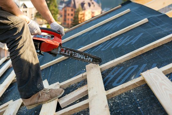 Our team carrying out roof repair services in Anchorage, AK