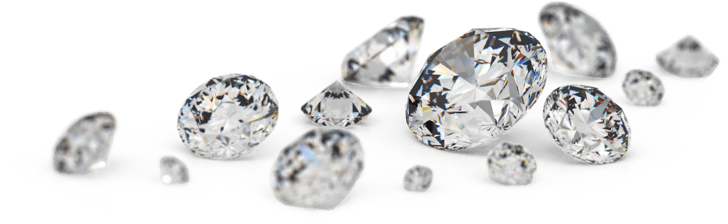A bunch of diamonds are sitting on top of each other on a white surface.