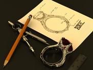 A drawing of a ring on a piece of paper next to a pencil , ruler , and compass.
