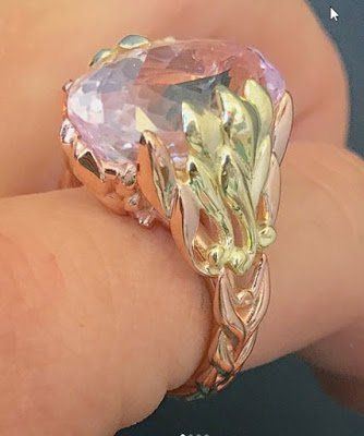 A close up of a ring on a person 's finger