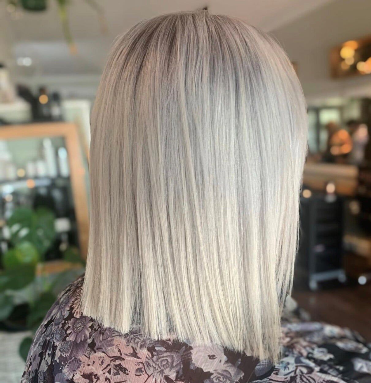 Mid length straight cut hair — Hairdressers Central Coast in Forresters Beach, NSW