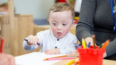 School Care — Teaching Baby in Daycare in Phenix City, AL School Care — Teaching Baby in Daycare in Phenix City, AL