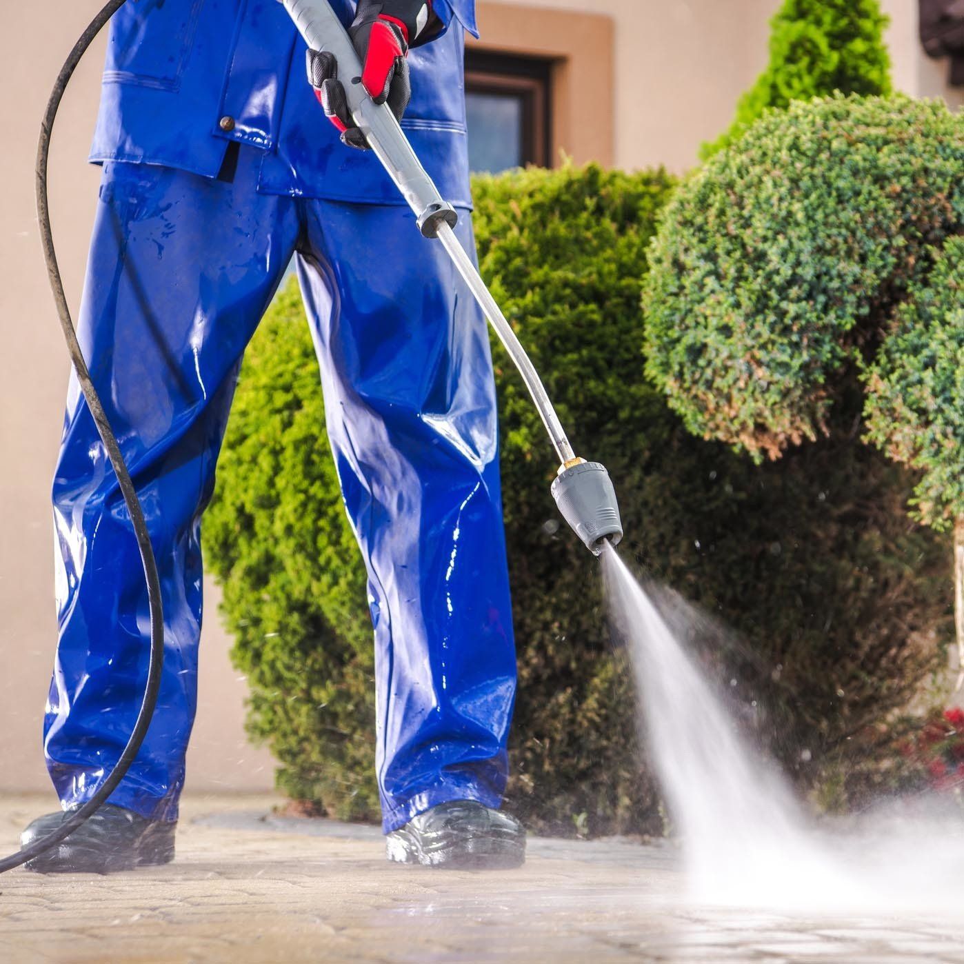 Power Washing on Concrete — Ewing, NJ — Pave Patrol, LLC High Pressure of Water for Cleaning the Sidewalk — Ewing, NJ — Pave Patrol, LLC