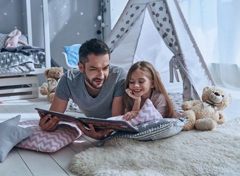 Father Reading a Book to His Daughter — Bucks County, PA — Ranniello Inc. Father Reading a Book to His Daughter — Bucks County, PA — Ranniello Inc.
