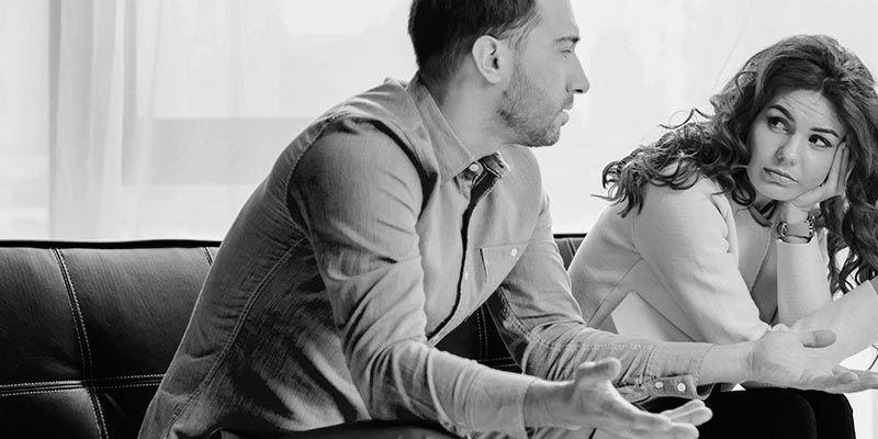 man talking to therapist woman looks upset
