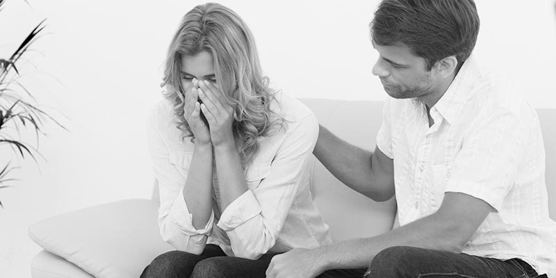 woman crying at therapist
