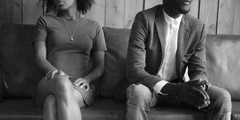 couple on couch angry