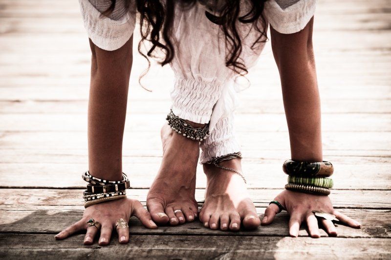 woman touching the ground with her hand