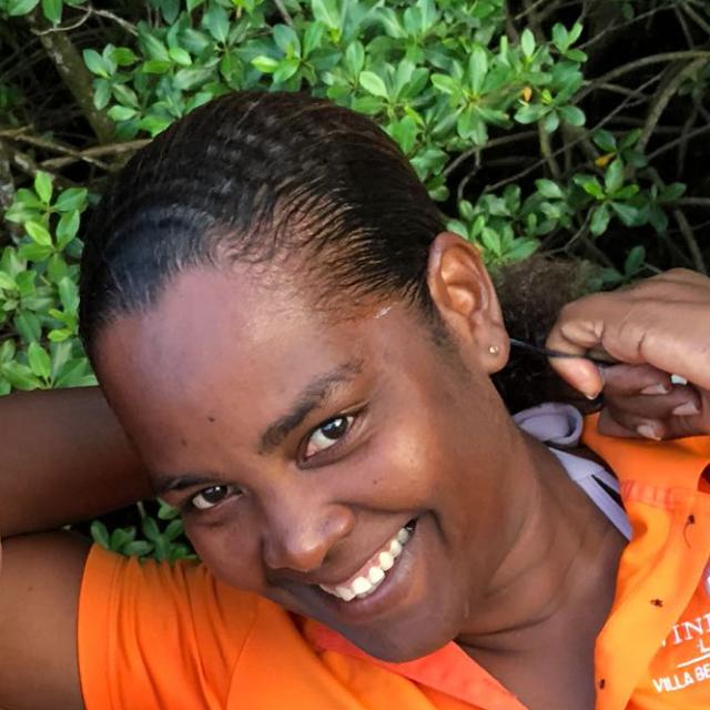 A Eget wearing an orange Eastern Caribbean Diving shirt.