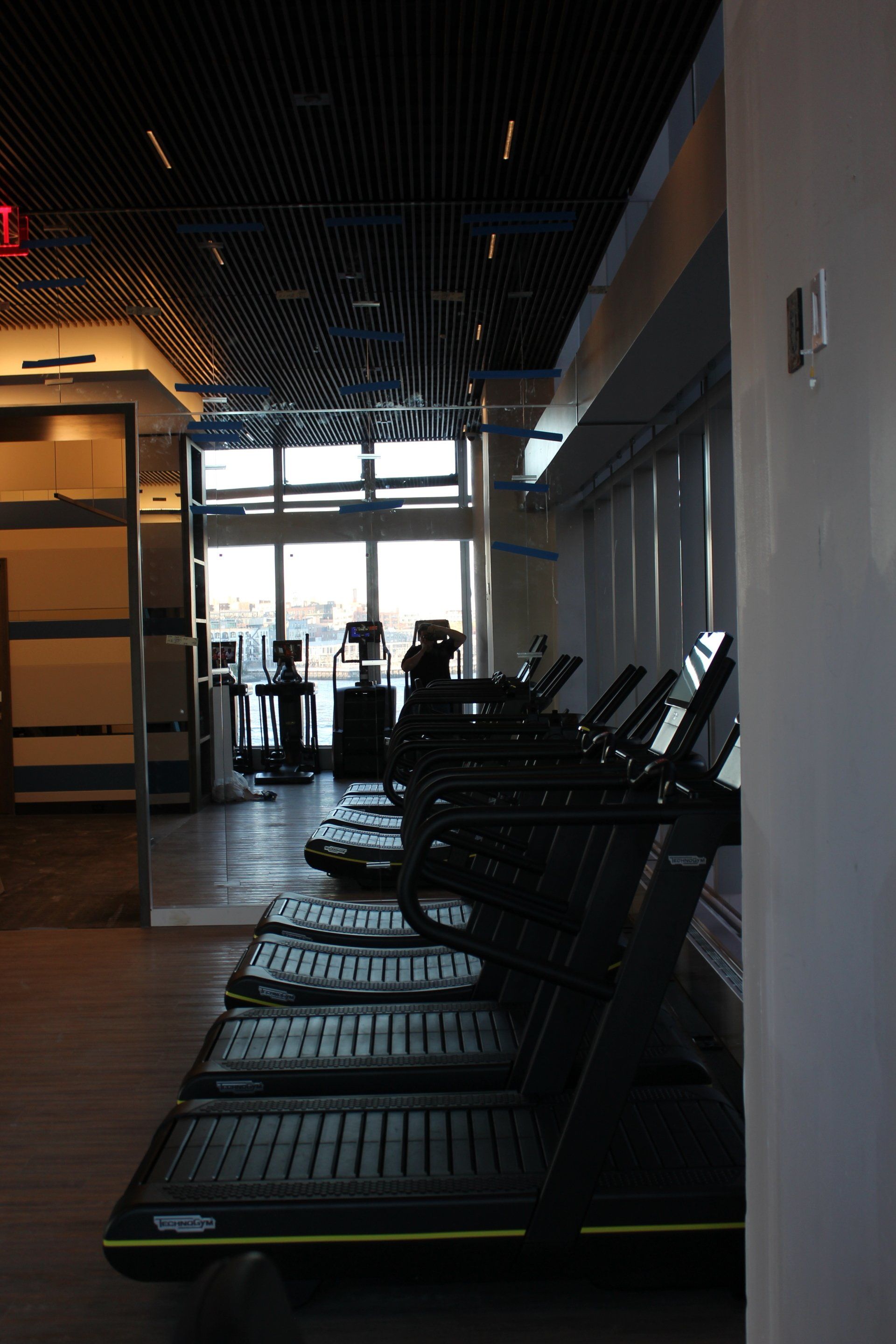 Fitness center with treadmills at One Manhattan Square.