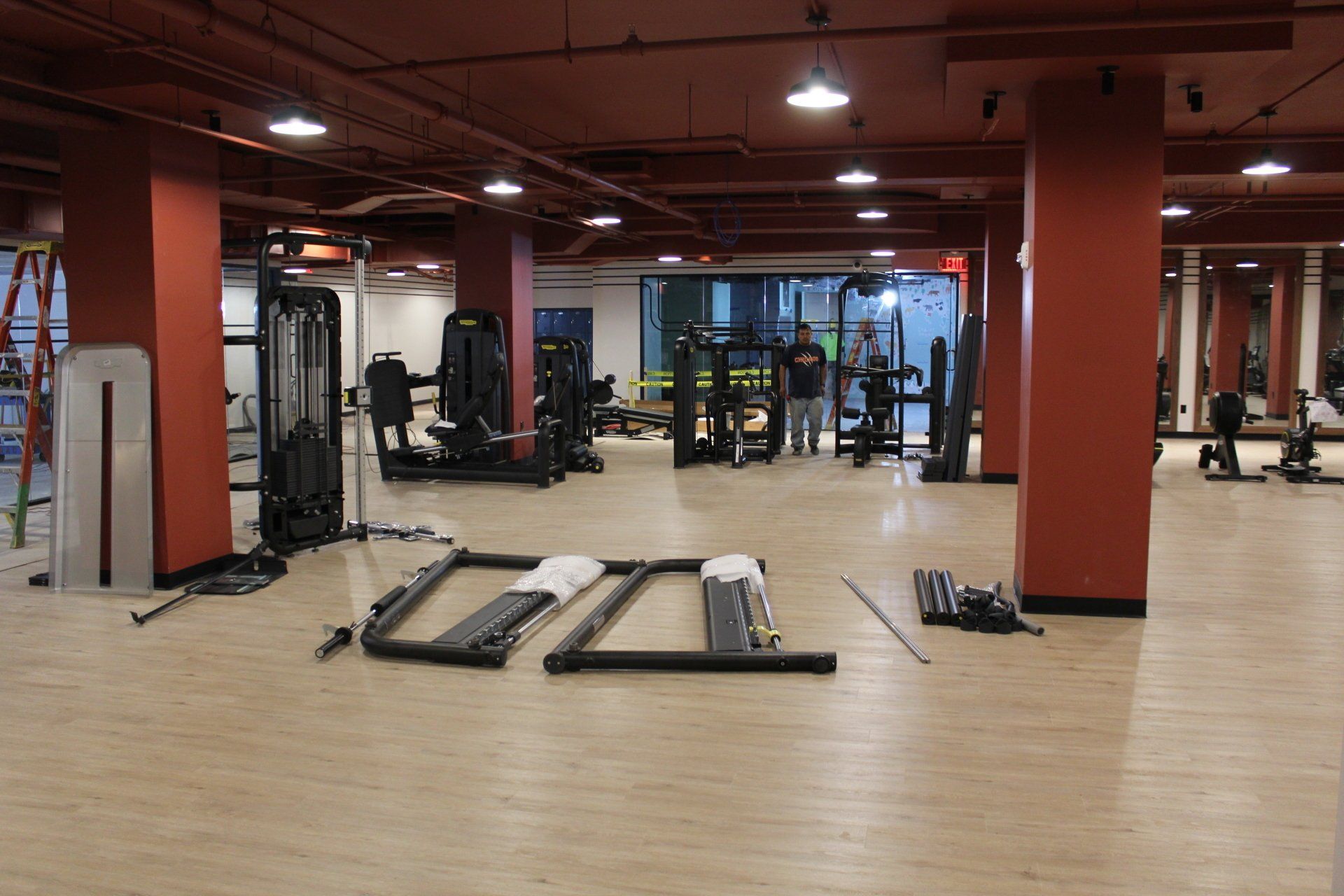 Cardio and strength training equipment inside the Twenty Exchange Place gym.