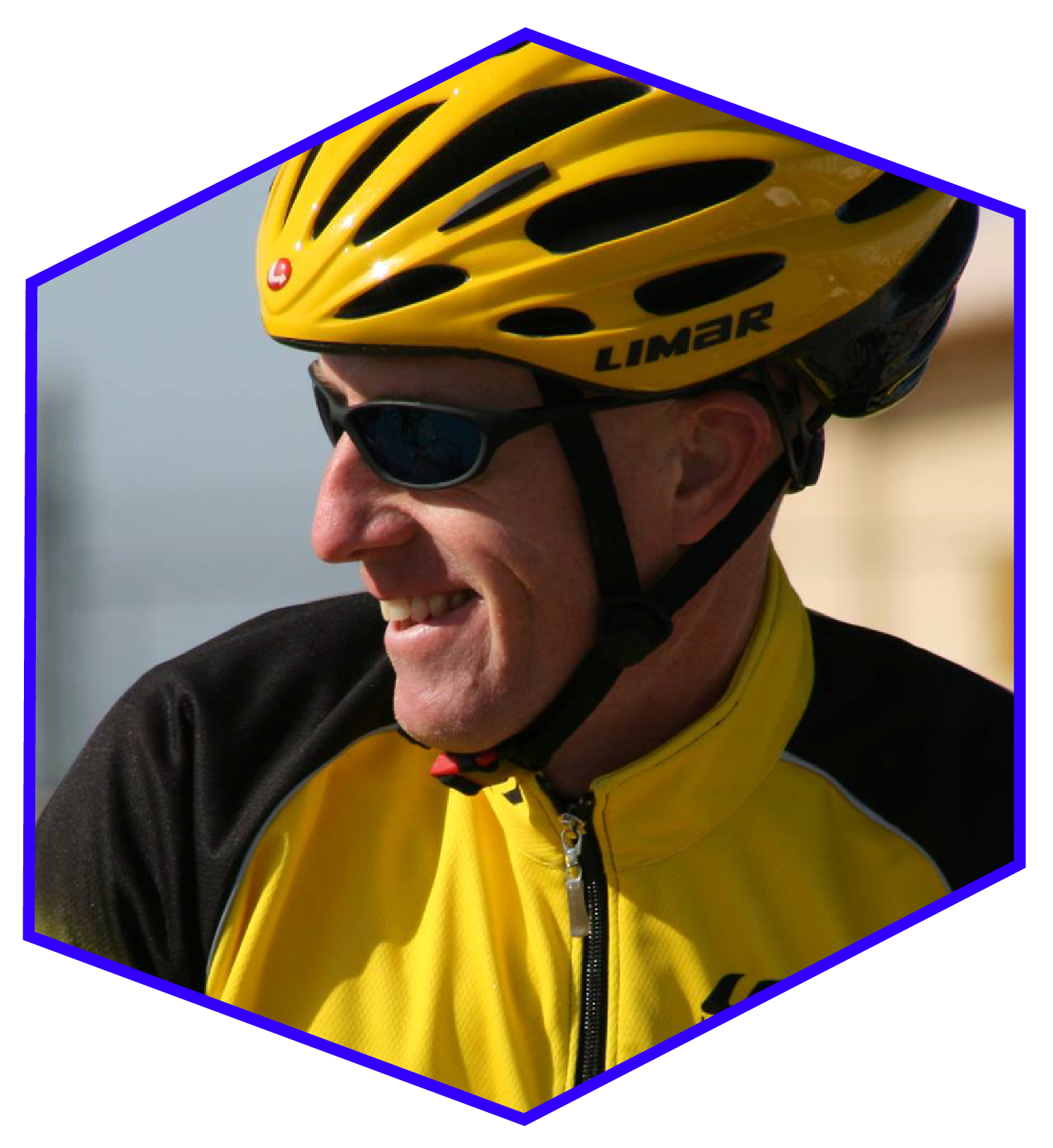 A man wearing a yellow helmet that says limar on it