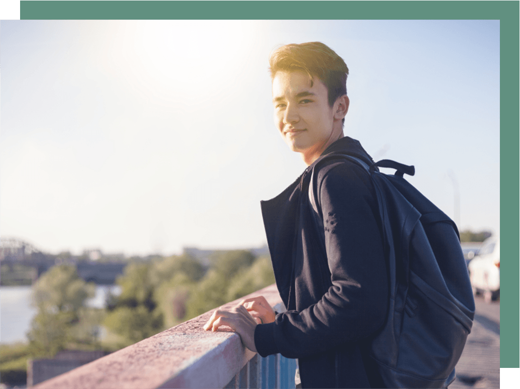 shutterstock_1140993830 16 year old boy on bridge