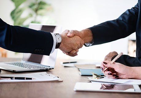 Men Shaking Hands — Olympia, WA — Bliss & Skeen, CPAs Men Shaking Hands — Olympia, WA — Bliss & Skeen, CPAs