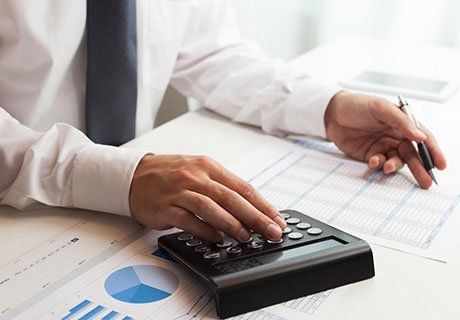Man Doing Calculations — Olympia, WA — Bliss & Skeen, CPAs