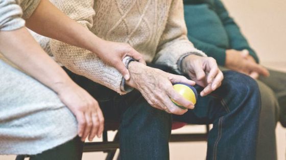 Our Cremation Prices Person Holding An Elderly Persons Arm Lovingly