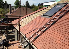 Slating, tiling and cedar shingles