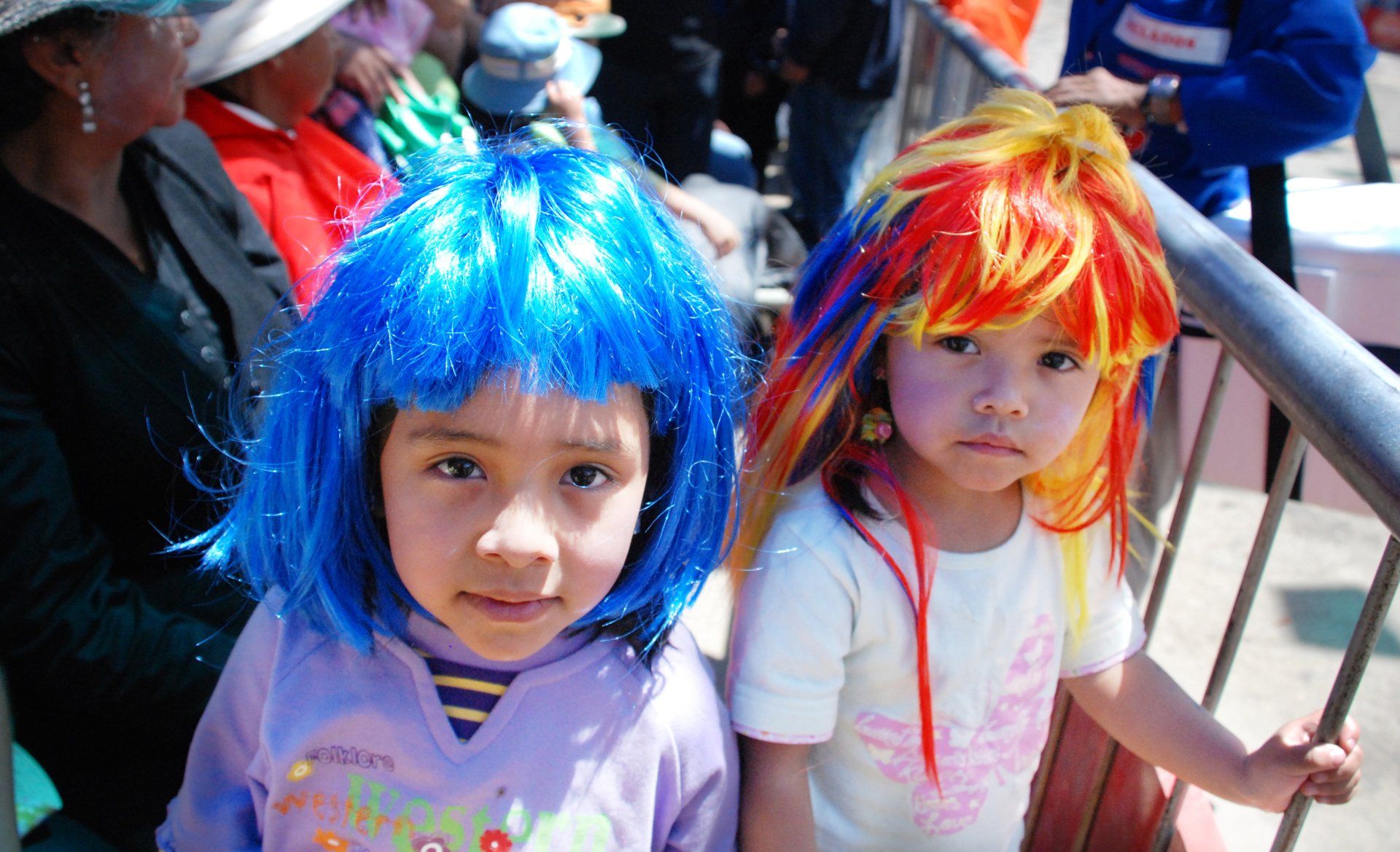 Children watching parade in Oruro, Bolivia during Carnaval.