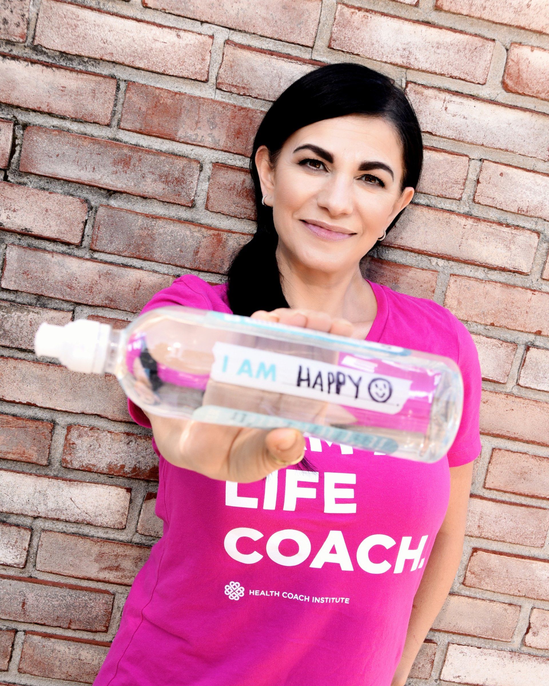 Lifestyle portrait of Marina Mannino Kitrell life and health coach.