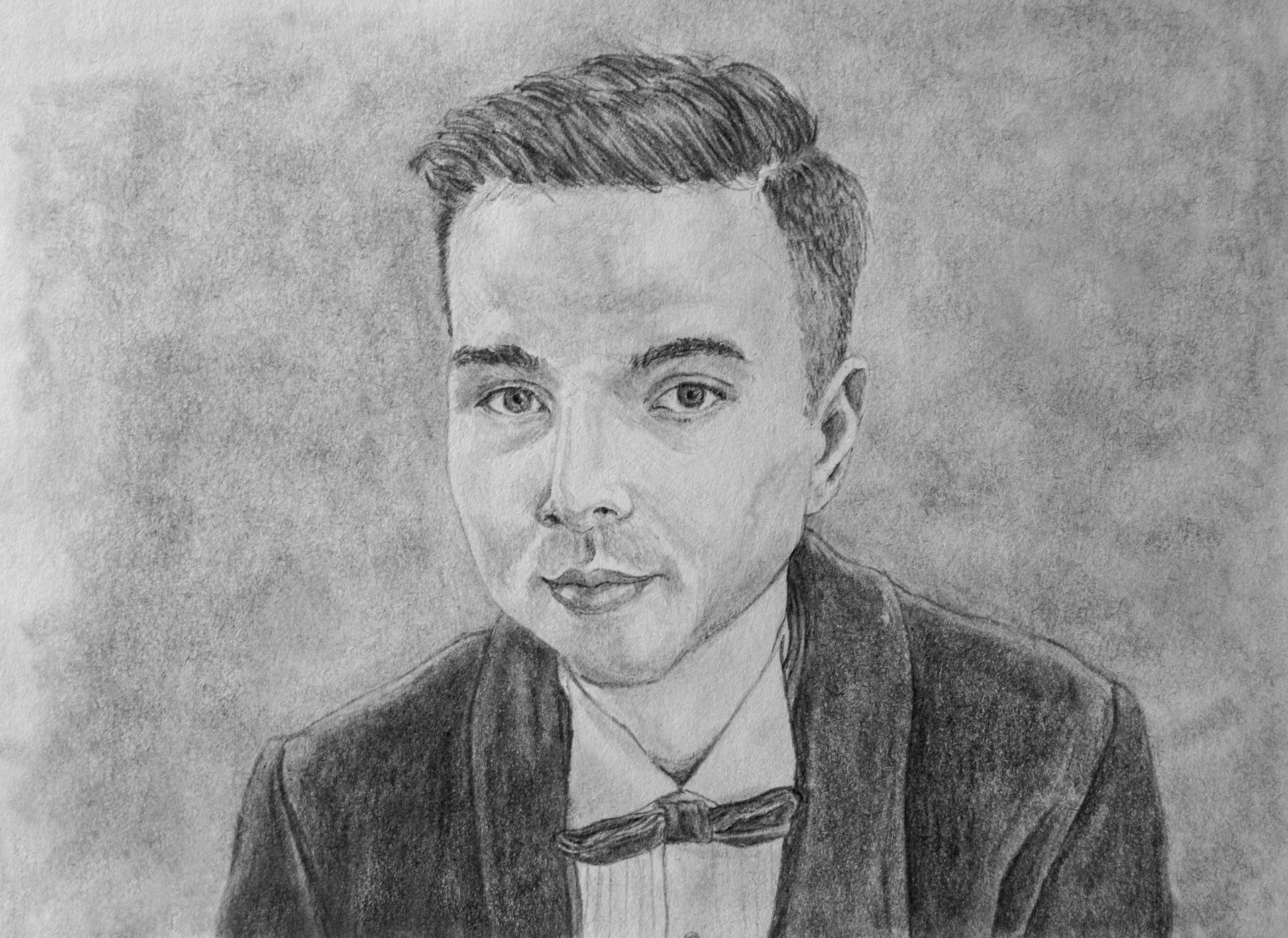 Pencil drawing of a person in a suit and bow tie, head tilted slightly with a neutral expression.