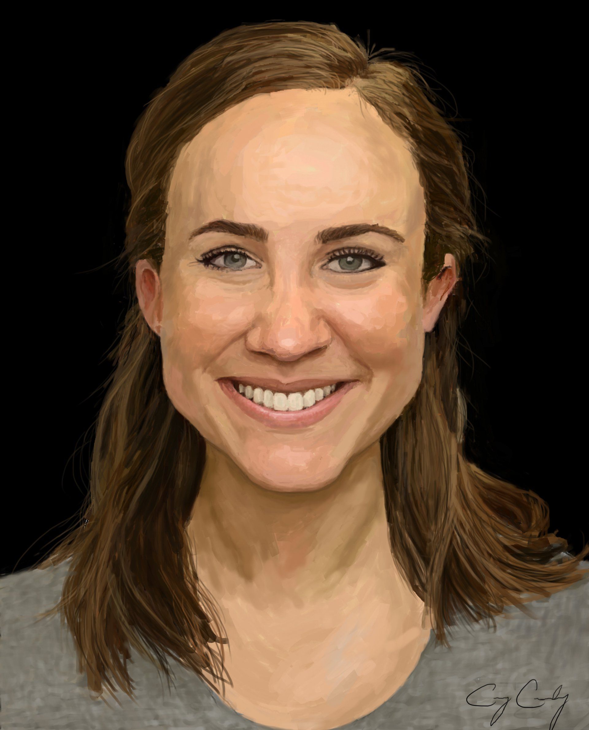 Smiling person with brown hair, in a gray shirt, against a black background.