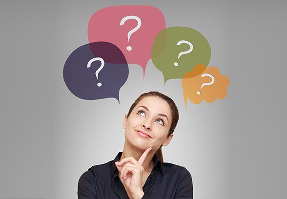 A young is thinking about questions.