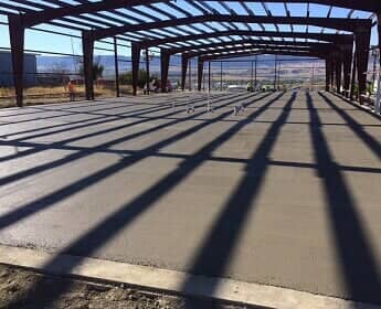 Welder working from cherry picker — construction work in Casper, WY