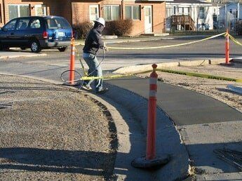 man ropes off went concrete - commercial construction in WY