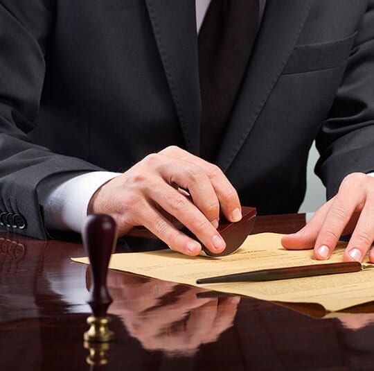 Lawyer writing on paper - Law Office in York, PA
