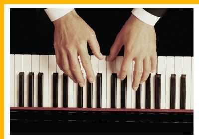 man playing the keyboard