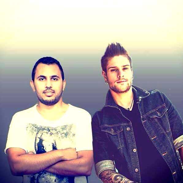 Two men standing next to each other with their arms crossed